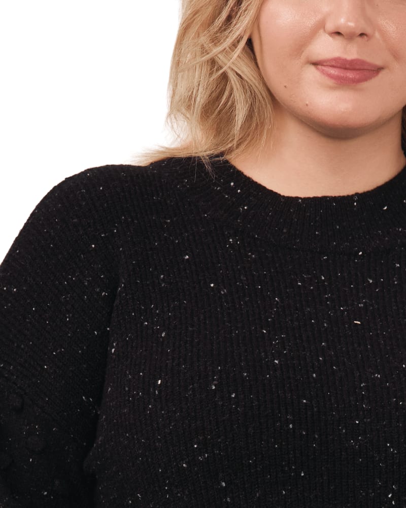 Side of a model wearing a size 1X Carrie Bobble Sleeve Sweater in RICH BLACK by CeCe. | dia_product_style_image_id:263525